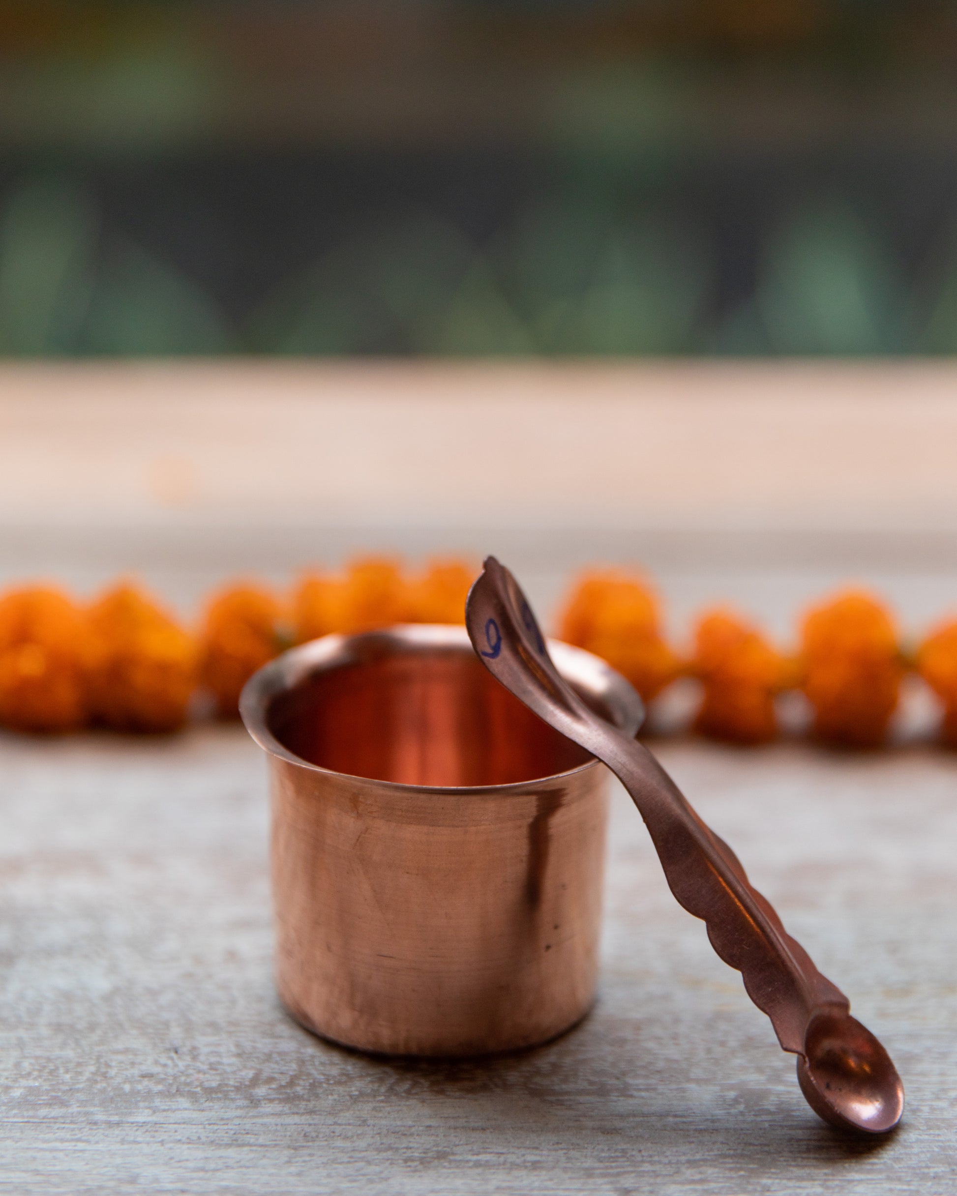 Achmani Patra Is a traditional item used in Vedic temple worship for purification.