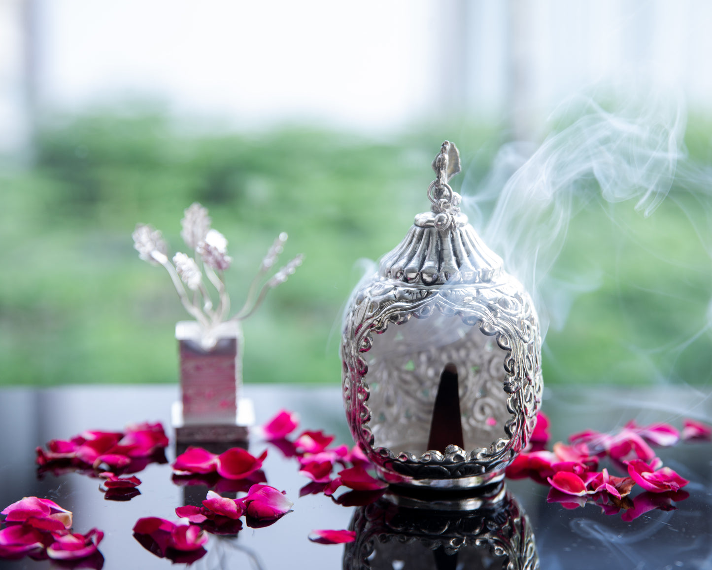 Coated with high-quality silver, this dhoop dhani radiates a lustrous and timeless glow.