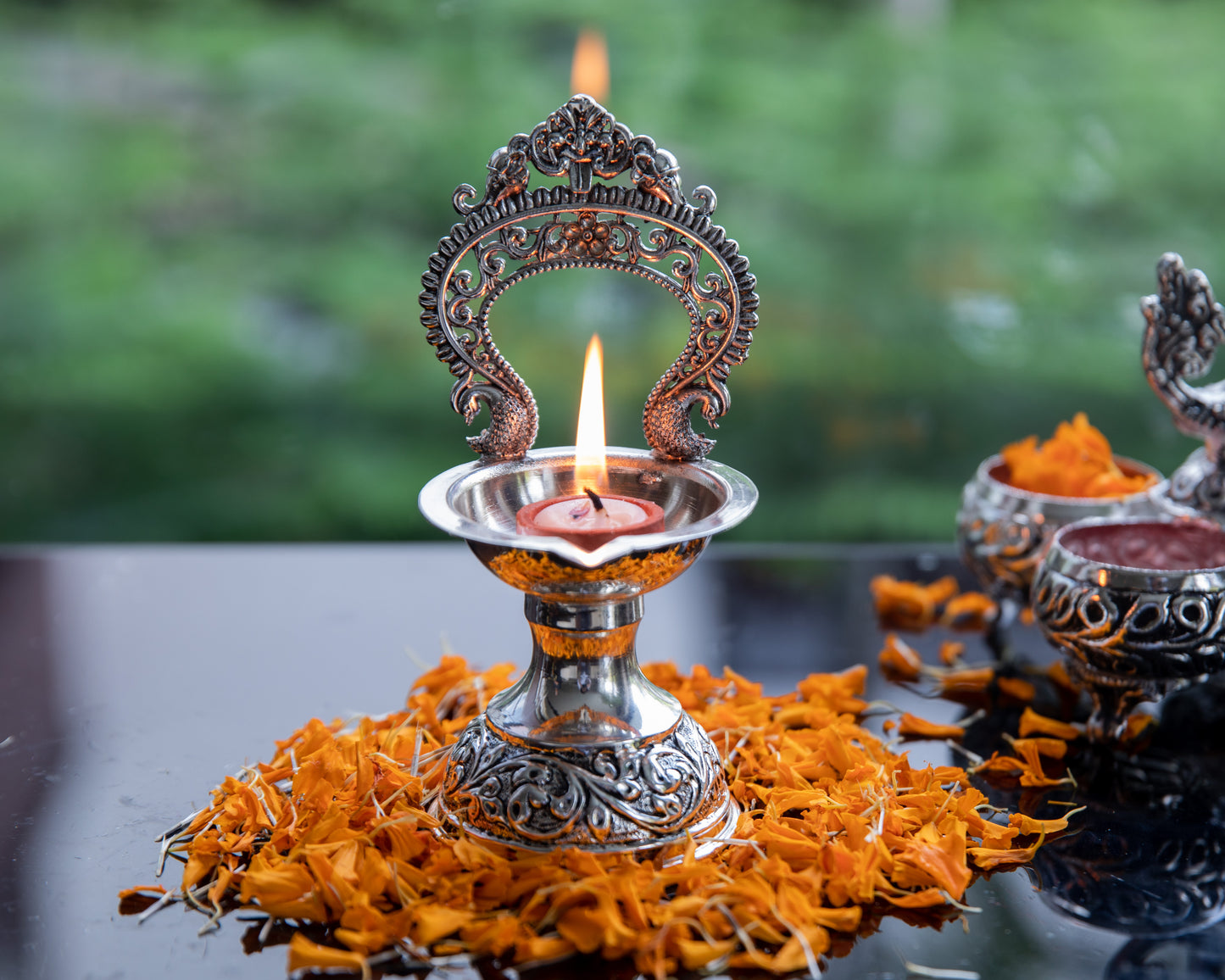 Prabhavali Diya is coated with high-quality silver, this diya radiates a lustrous and timeless glow when lit.