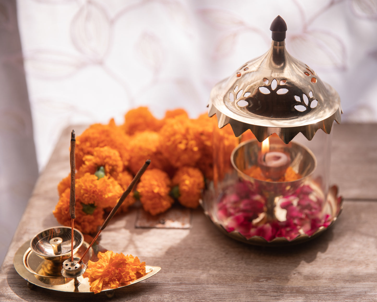 Our Glass Akhand Diya boasts a sleek and elegant design crafted from high-quality, transparent glass.