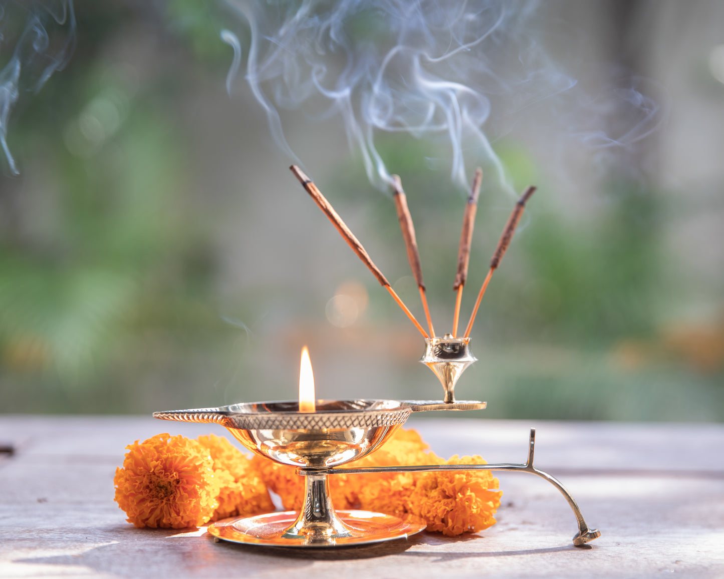 Our product serves a dual purpose. The diya, with its enchanting glow, while the attached agarbatti stand lets you create a harmonious ambiance.