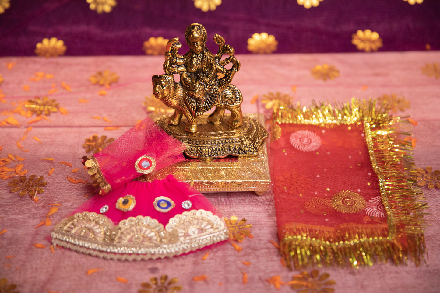Comes as a set of Maa Durga Idol, Mata ki chowki, Mata ki Chunri, and Mata Ki Pushak.