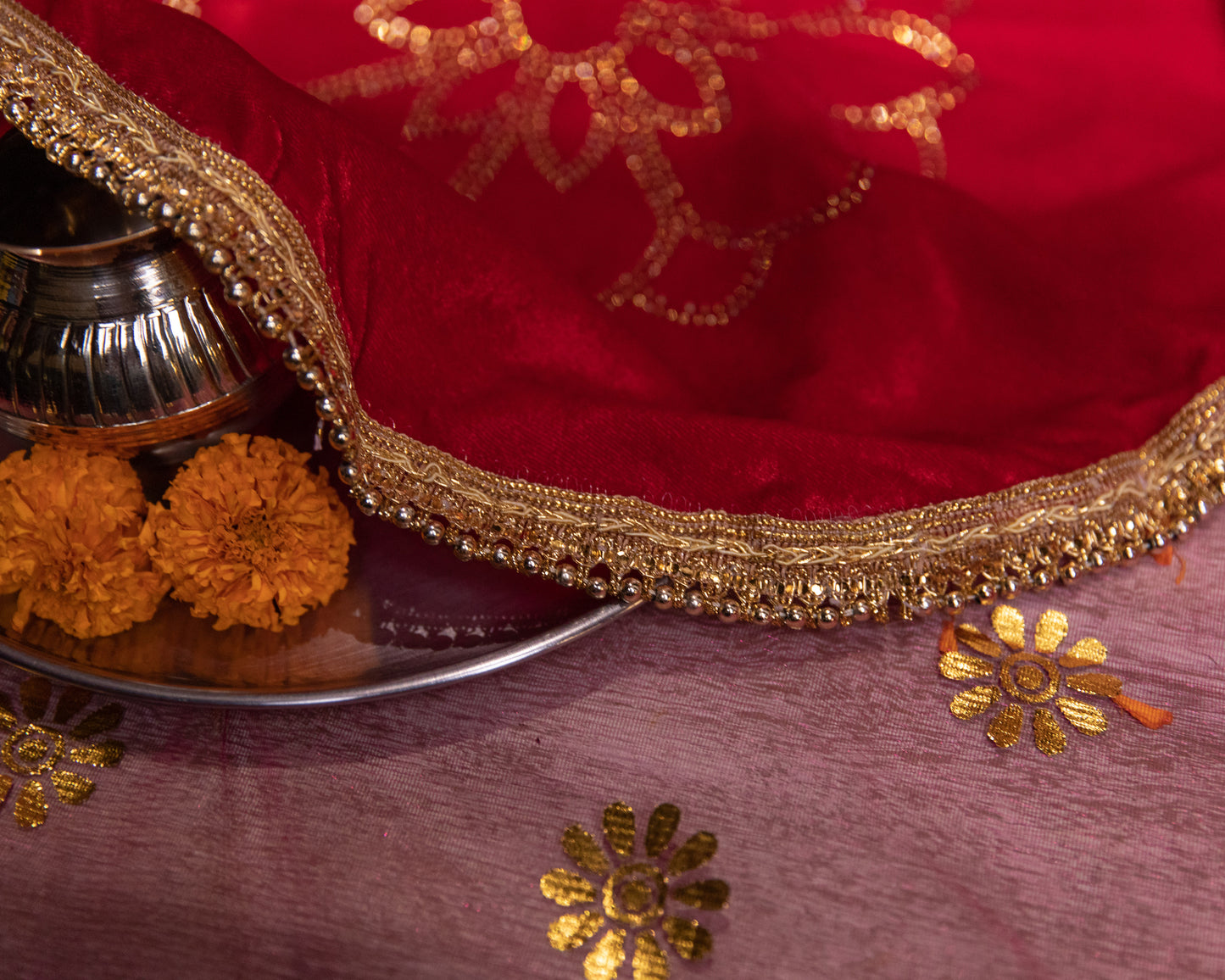Our Red Velvet Thali Cover is made from beautiful velvet fabric, which not only feels soft to the touch but also radiates opulence and sophistication.
