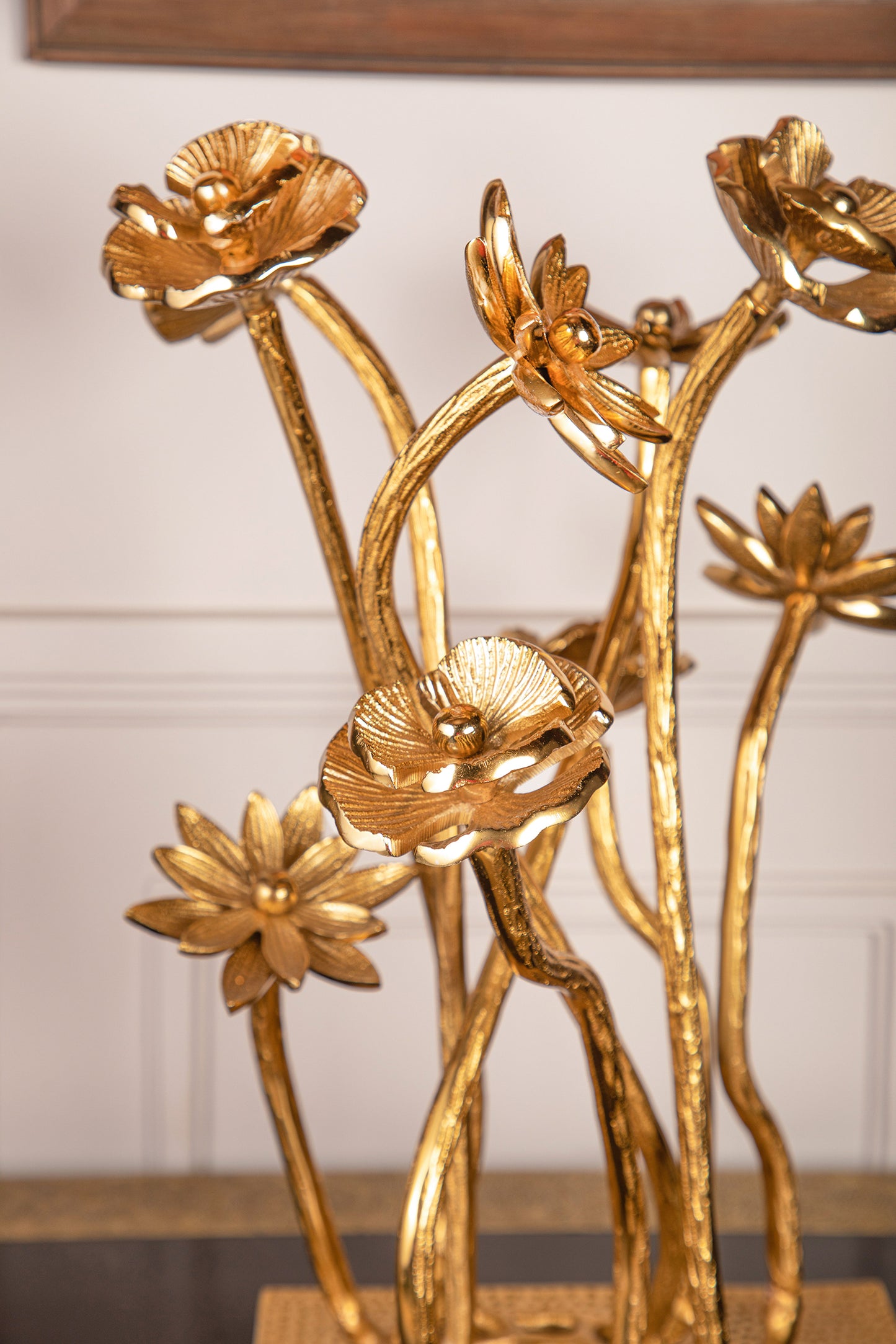 Crafted from pure brass and inspired by the intricate details of blossoming flowers.