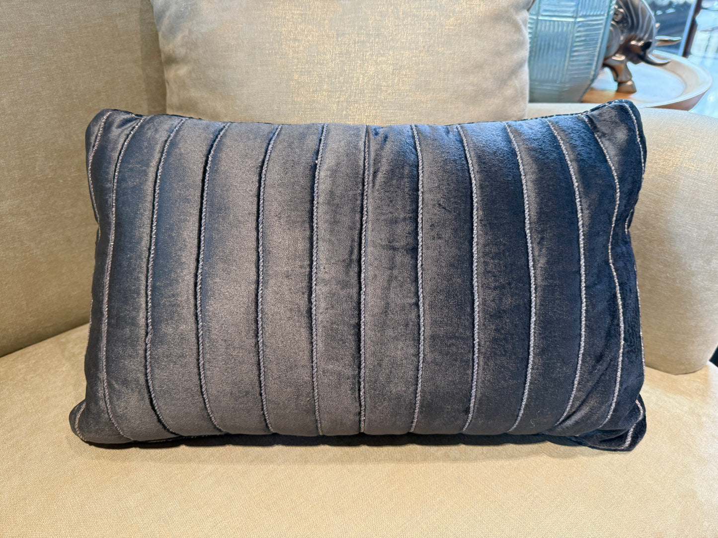 The Noir Velvet Cushion is crafted from ultra-soft velvet in a rich charcoal black, elevated with subtle vertical tufting that adds texture and polish.