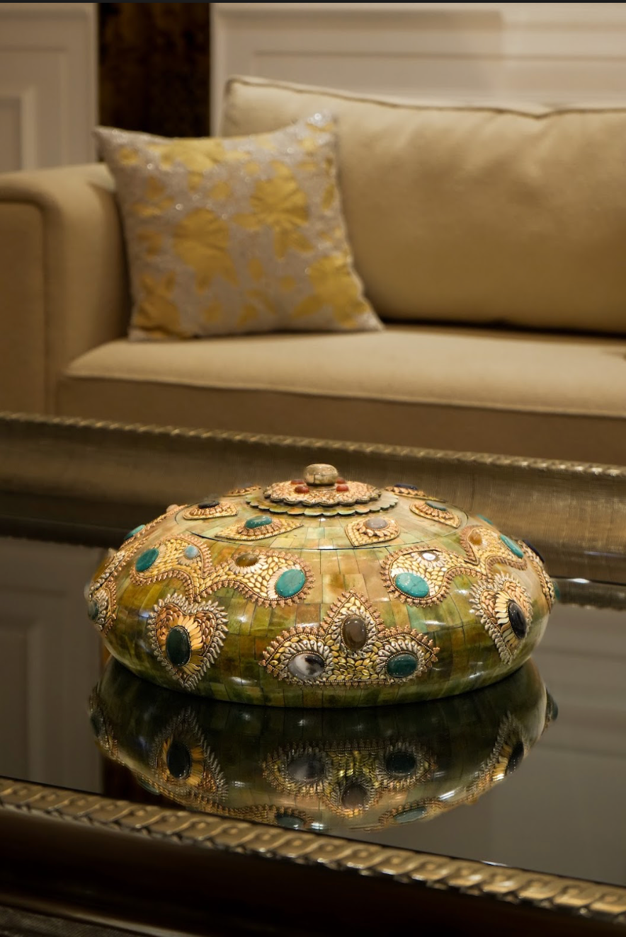 A masterpiece of craftsmanship and luxury. Crafted from camel bone and adorned with semi-precious stones, this tobacco box is a true work of art that exudes opulence and sophistication.