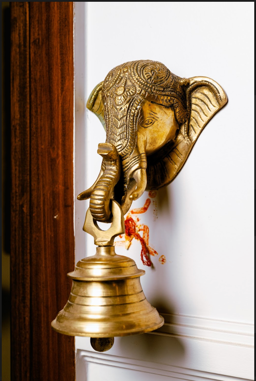 Featuring the serene visage of Lord Ganesha, the remover of obstacles and harbinger of prosperity, this beautifully crafted brass bell serves as both a striking decorative piece and a symbol of devotion.