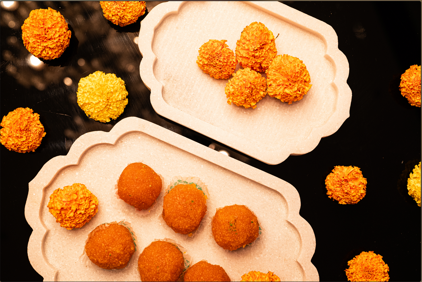 Marble Serveware Platters – Set of 2 Elevate your festive serving experience with our handcrafted Marble Serveware Platters.  Carved from premium white marble, each platter features a scalloped edge that adds a refined touch of sophistication.