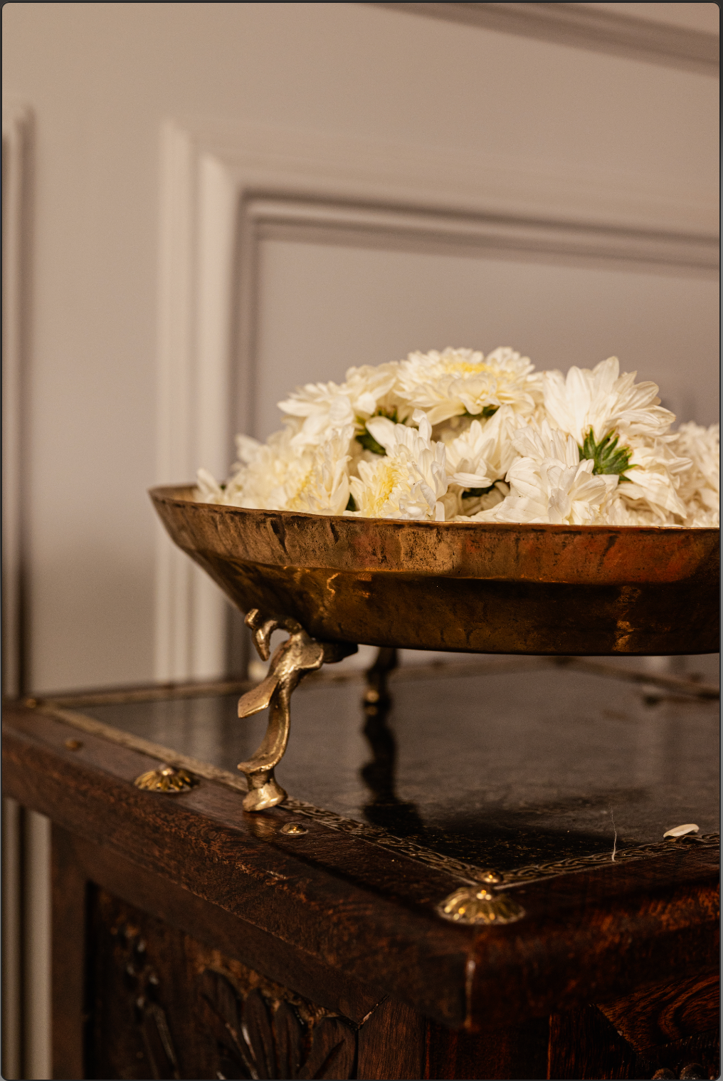 Handcrafted by skilled artisans, this decorative piece features an intricately designed stand that elevates the beauty of its traditional form. Perfect for adorning your living space with fresh flowers, floating candles, or even water for a serene ambiance.