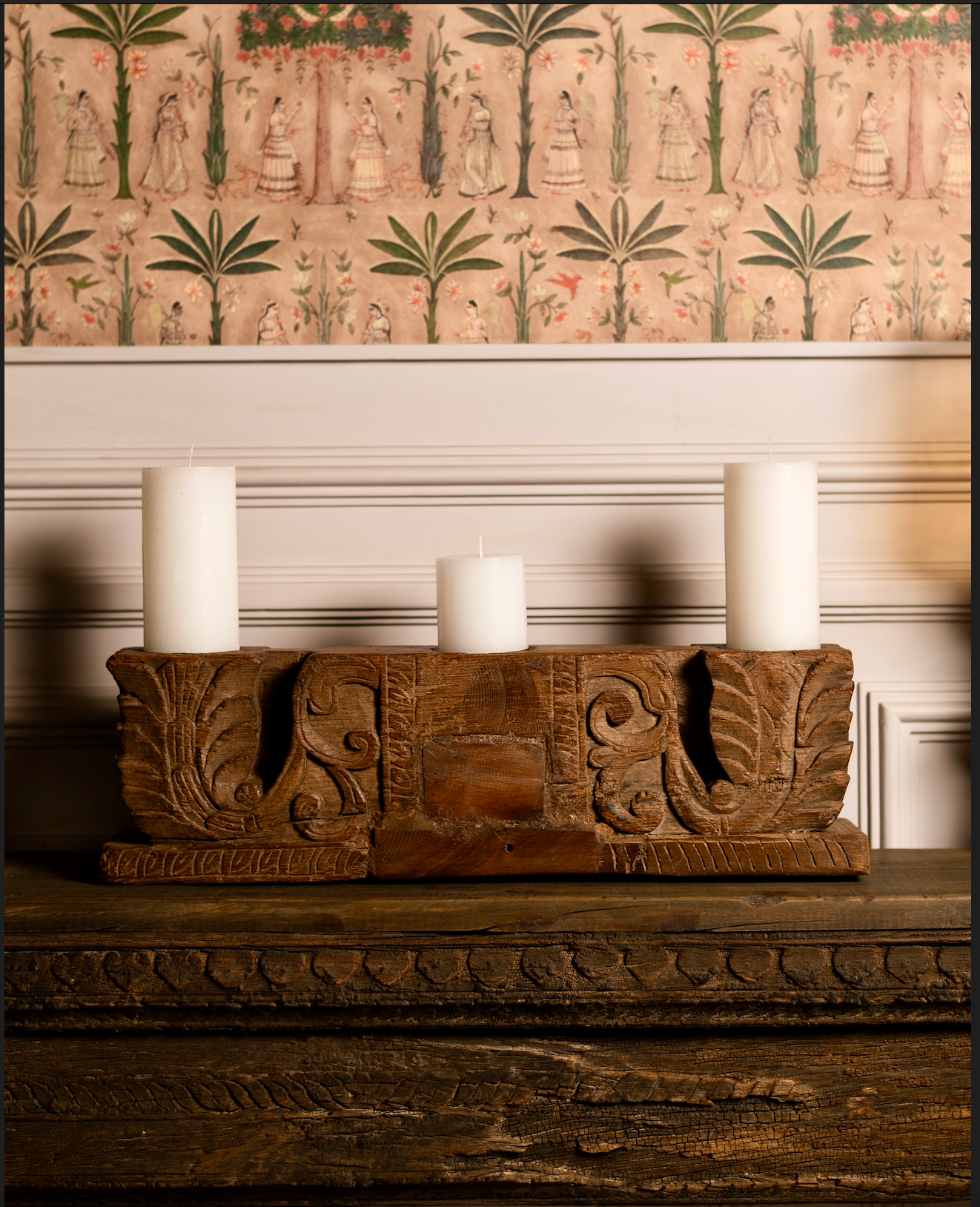 The Samya Stambh celebrates symmetry and proportion in handcrafted design. Carved from solid reclaimed wood with a natural aged patina, its elongated form and balanced flower motifs create harmony between heritage and modern styling.