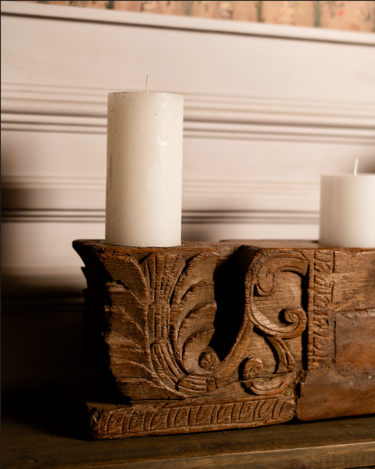 The Samya Stambh celebrates symmetry and proportion in handcrafted design. Carved from solid reclaimed wood with a natural aged patina, its elongated form and balanced flower motifs create harmony between heritage and modern styling.