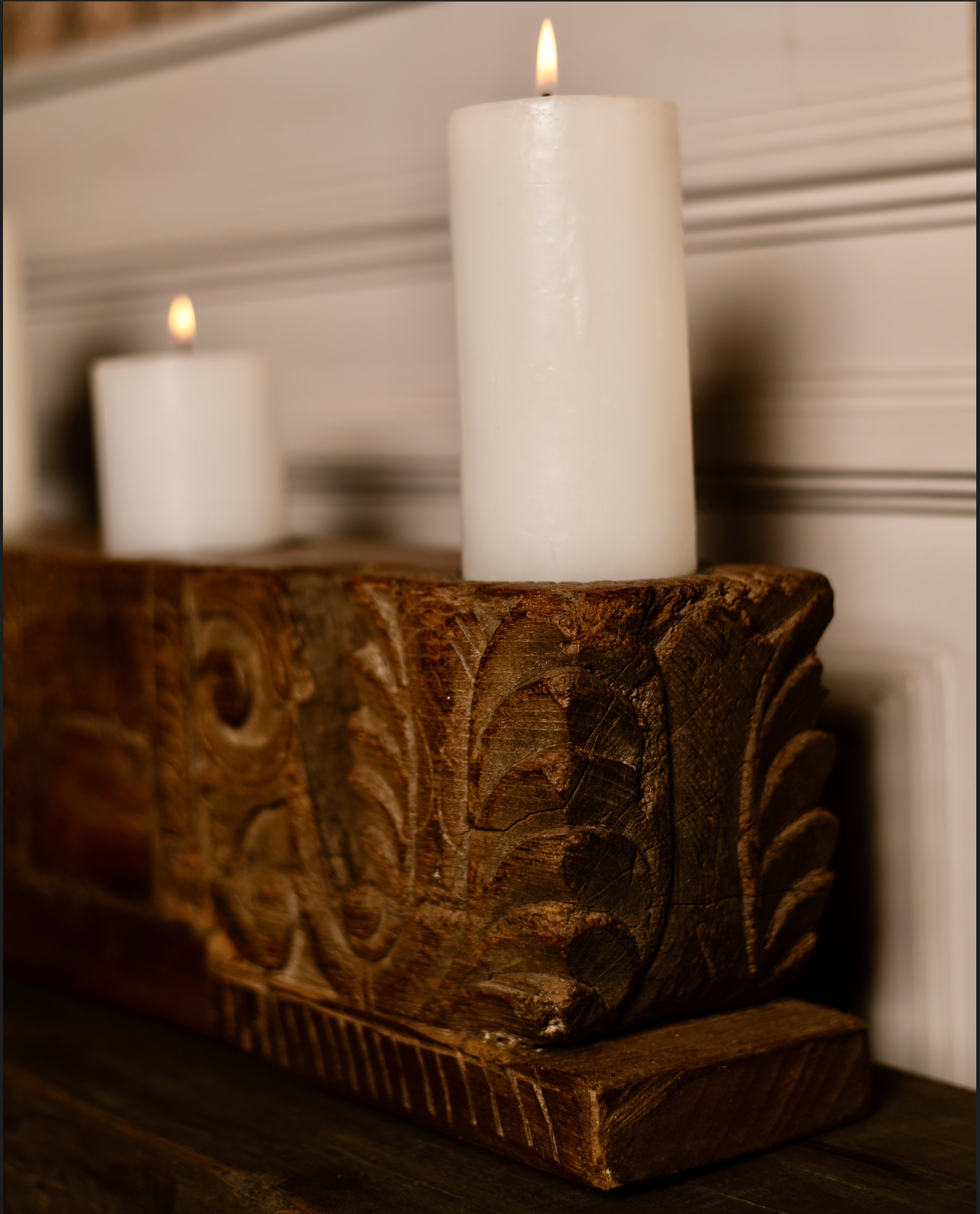 The Samya Stambh celebrates symmetry and proportion in handcrafted design. Carved from solid reclaimed wood with a natural aged patina, its elongated form and balanced flower motifs create harmony between heritage and modern styling.