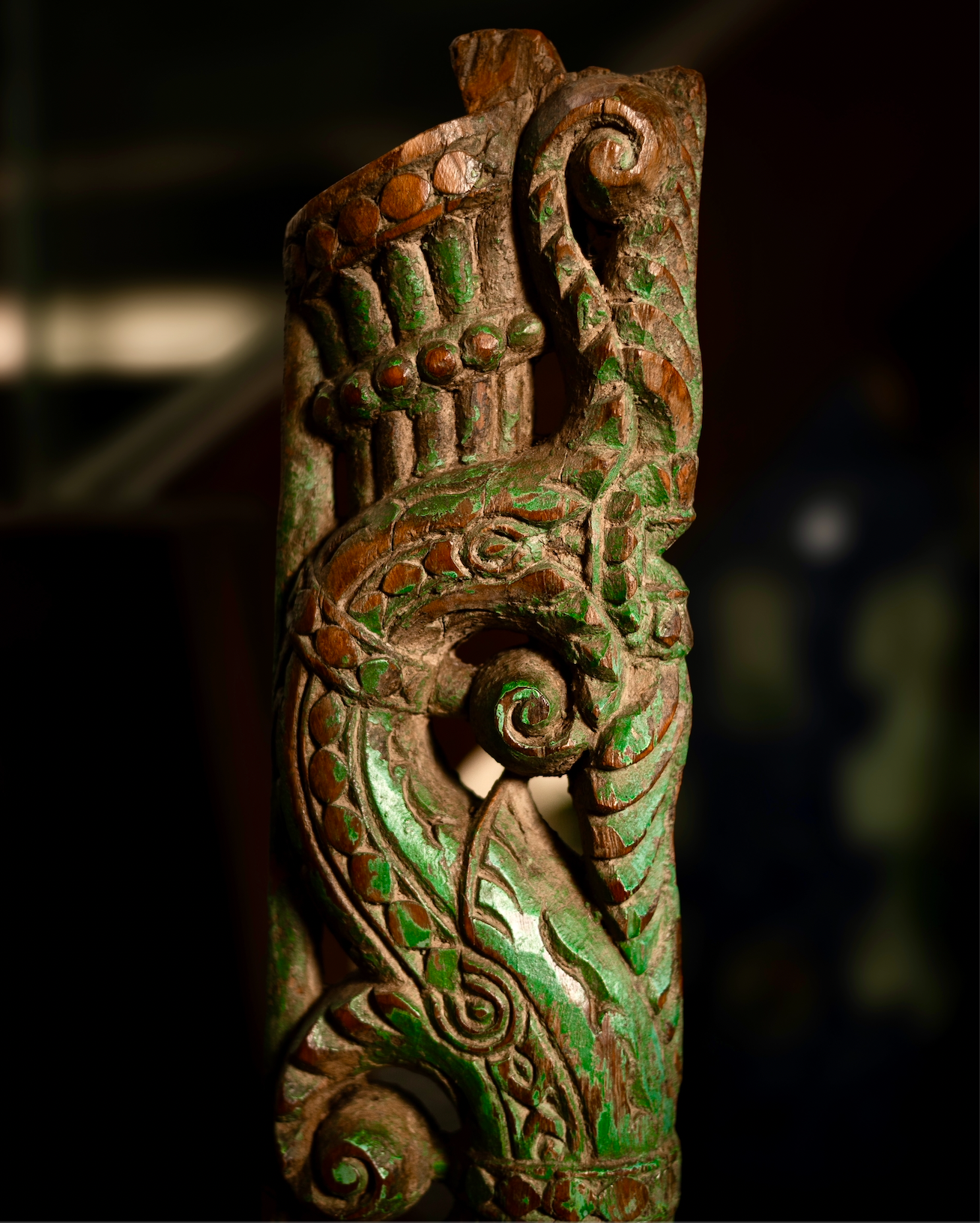 The Kritika brackets are salvaged fragments of heritage architecture, hand-carved from solid wood and finished with natural plant-based colors. Each piece is unique — Kritika I in deep green tones and Kritika II in earthy terracotta with teal accents