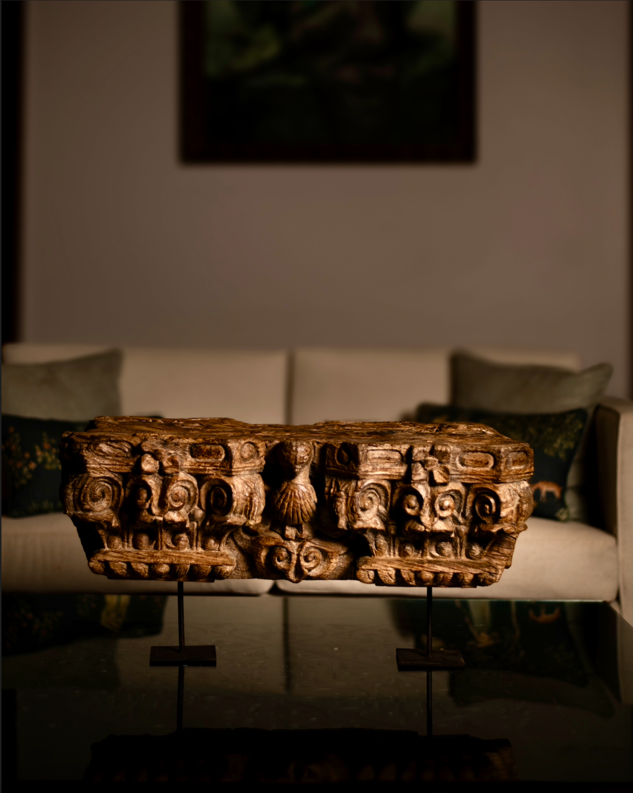 The Garuda Shilp is a remarkable salvaged fragment of heritage architecture, hand-carved from solid wood. With ornate scrollwork and a central bird motif reminiscent of Garuda, it reflects the grandeur and symbolism of temple and haveli design.
