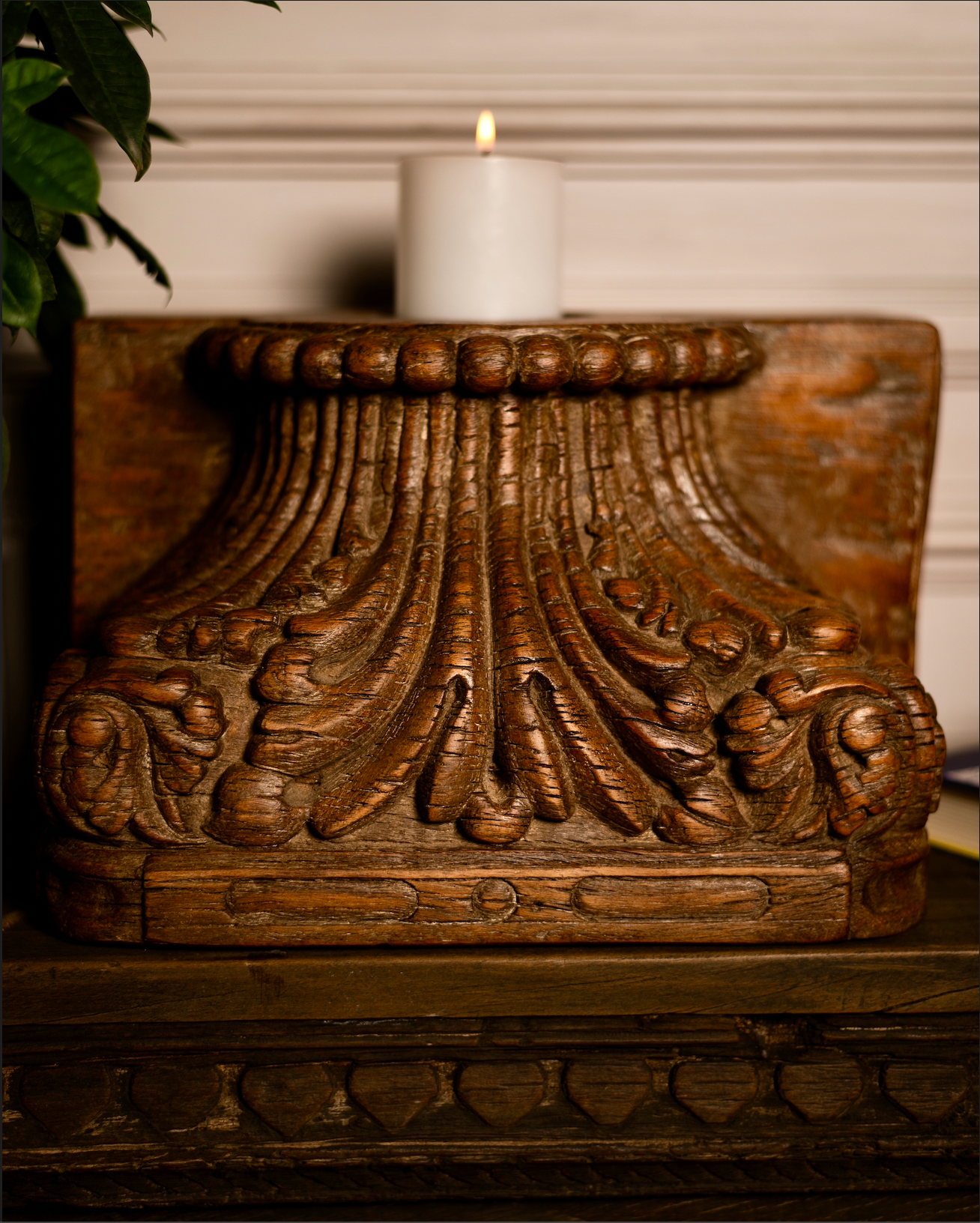 Hand-carved from solid reclaimed wood, the Padma Stambh Candle Pedestal is a statement of timeless grandeur. Its fluted, lotus-inspired detailing and natural aged finish recall fragments of temple architecture, carrying with them a sense of stillness and strength.