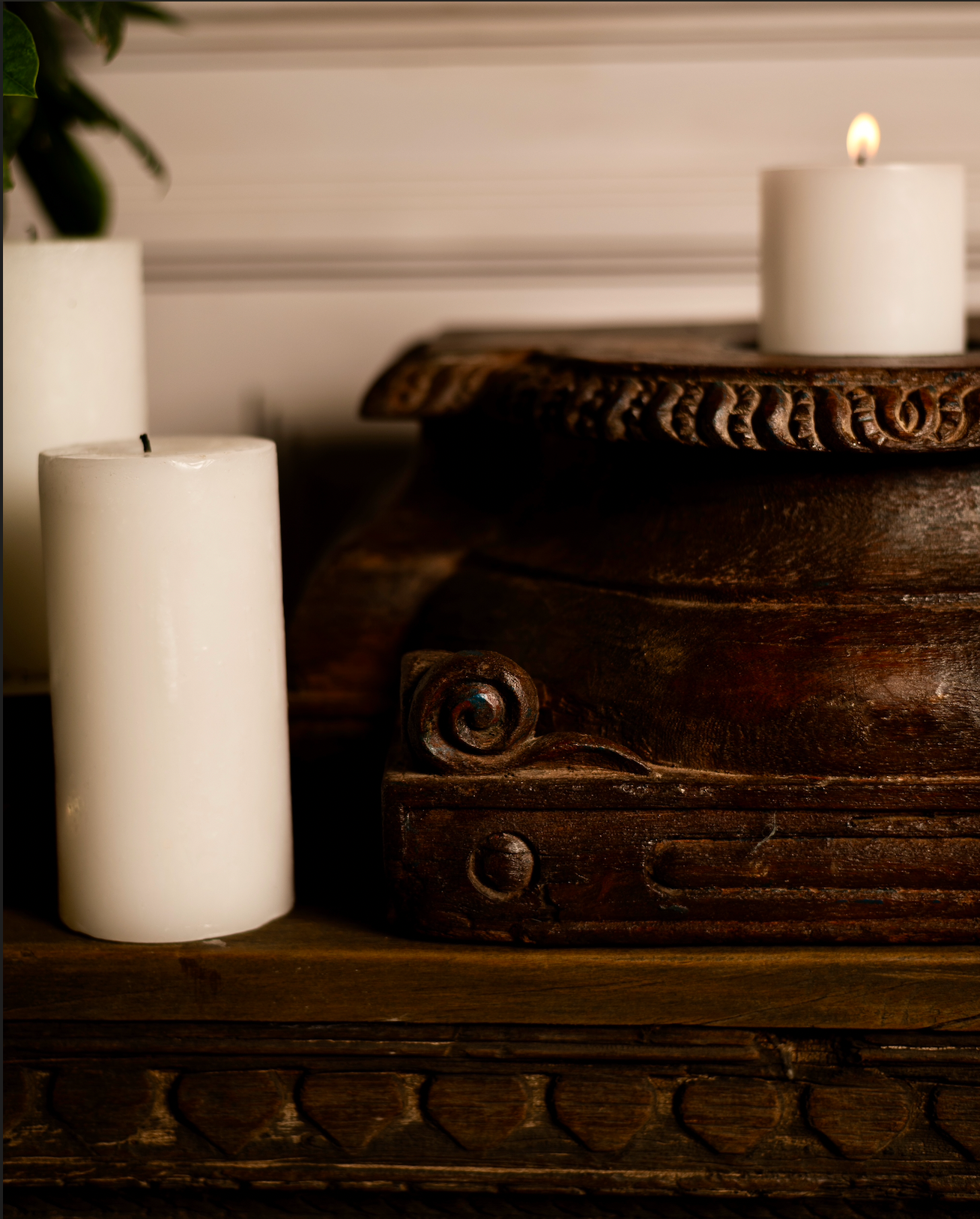 An antique wooden pedestal reimagined as a candle holder, Jyotirmay carries the glow of heritage and the warmth of tradition. Its hand-carved details and deep, rich patina make it a timeless accent for your living space.