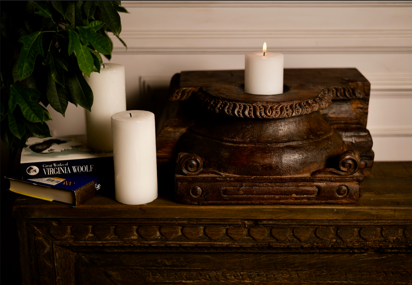 An antique wooden pedestal reimagined as a candle holder, Jyotirmay carries the glow of heritage and the warmth of tradition. Its hand-carved details and deep, rich patina make it a timeless accent for your living space.