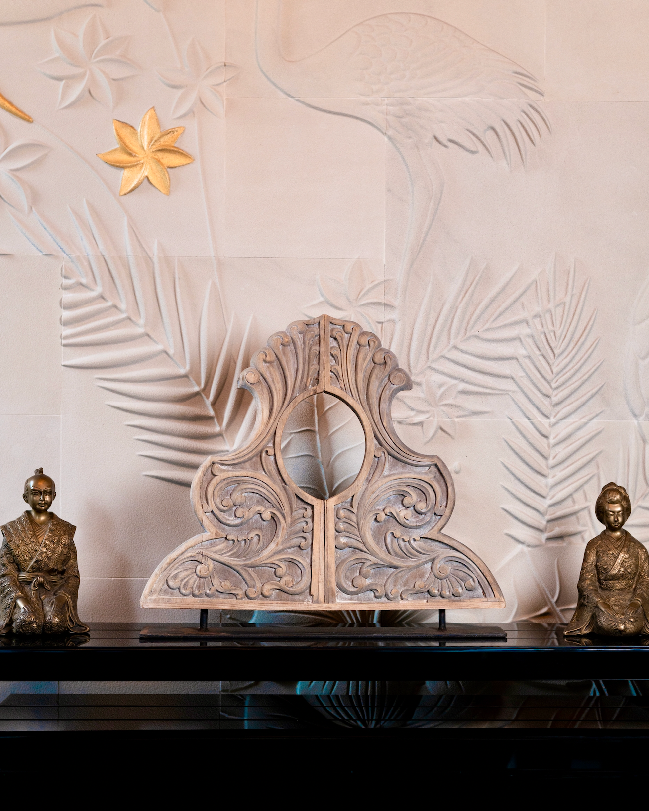 Hand-carved from reclaimed wood, its intricate swirling patterns echo the grandeur of temple and haveli architecture. Traces of blue-green (teal) pigment, derived from plant-based colour.