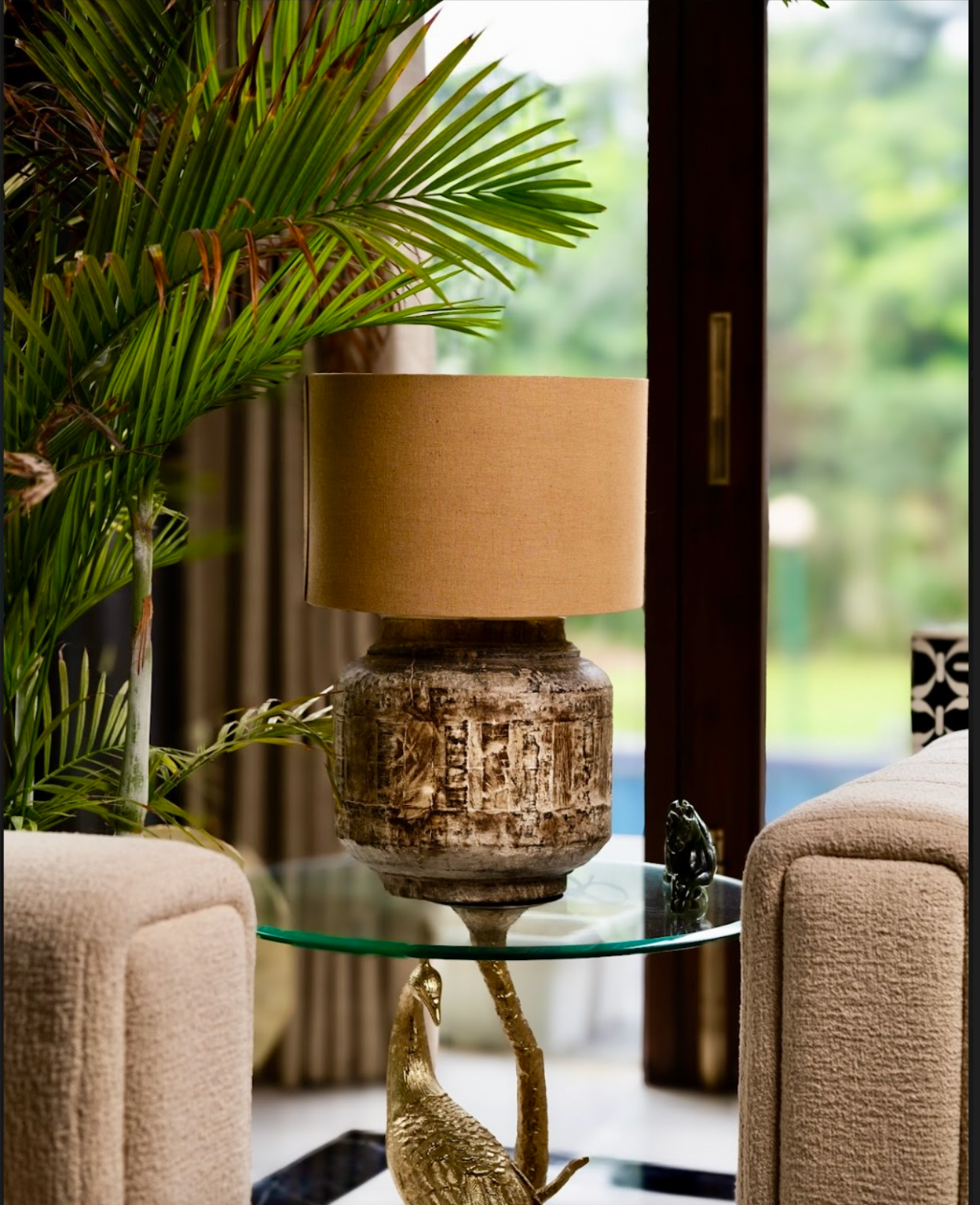 The Vana Prakāsh Table Lamp is a harmony of tradition and nature, hand-turned from solid vintage wood and finished with plant-based, natural colors.