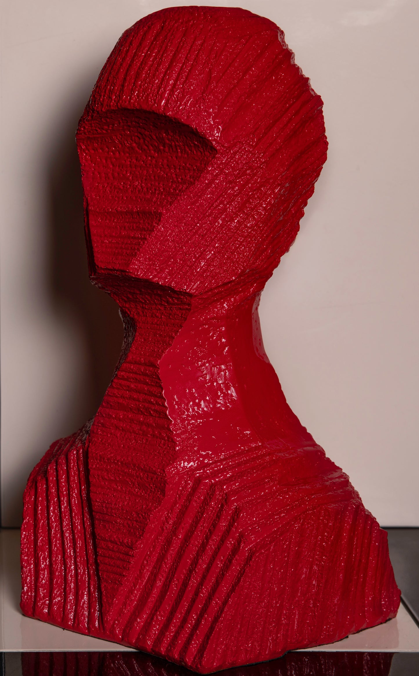 A Wooden Man Sculpture named Amon made with mango wood in Red colour.