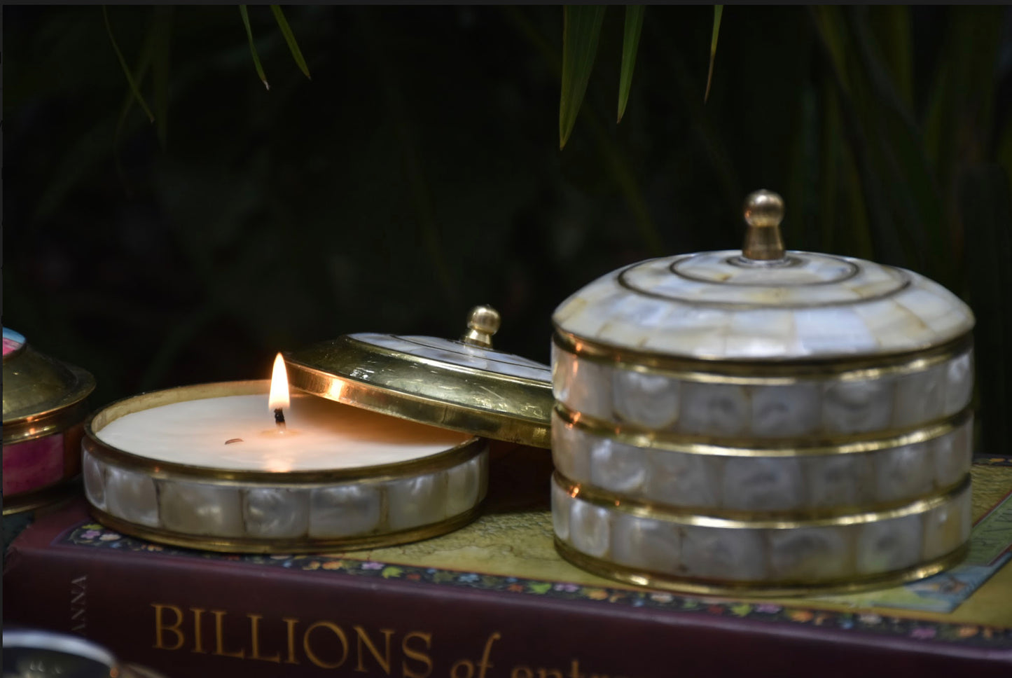 Scented Candles, Made with SoyBean Wax in a Brass container with and Mother of Pearl. These come in SIX different Frangrances.