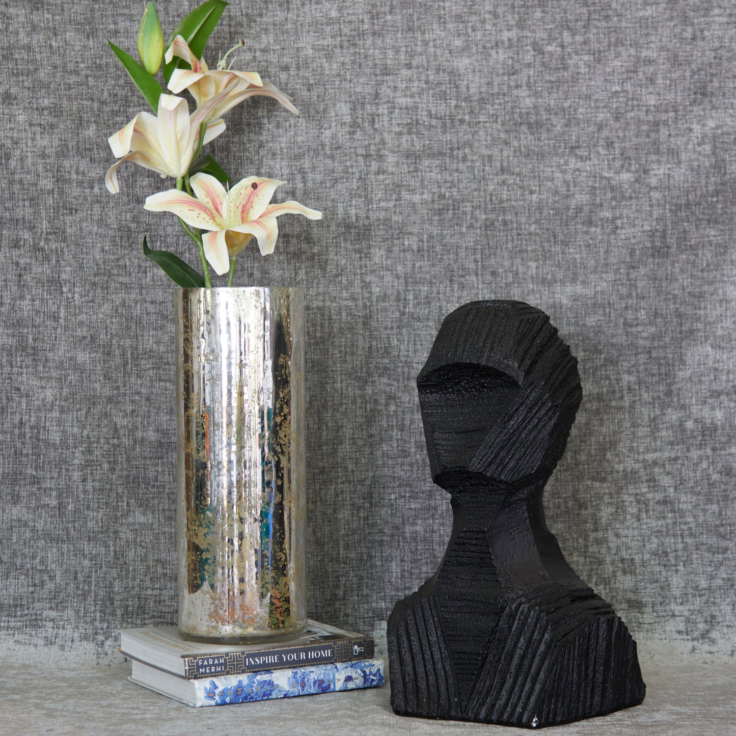 A Wooden Man Sculpture named amon made with mango wood in black colour.