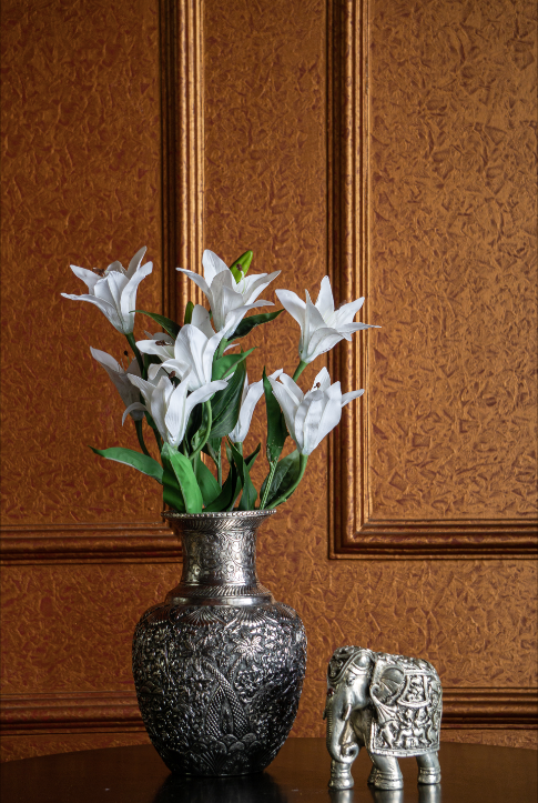 A Stunning Silver Elephant Decorative, hand carved with intricate details.