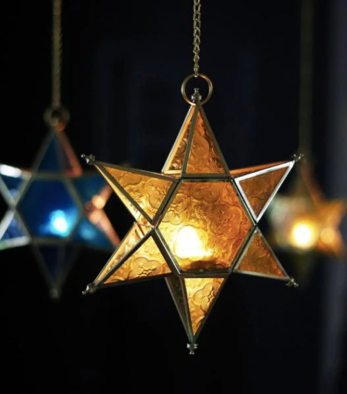 These colourful starlight tea light holders are made of lacquered brass and glass. Come in yellow, pink & blue.