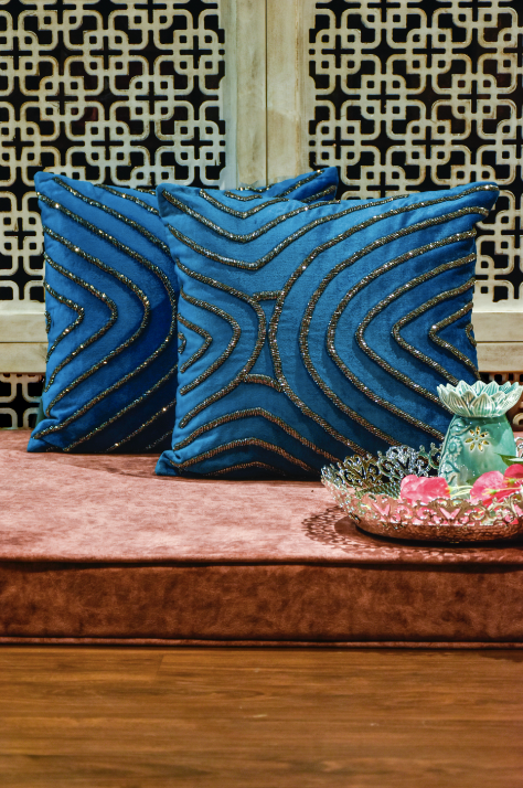 A Bold & Beautiful cushion, With Beautiful Oxidised Silver Beads Sewn onto the cushion in an abstract pattern, running across horizontally. 40 x 60 cm