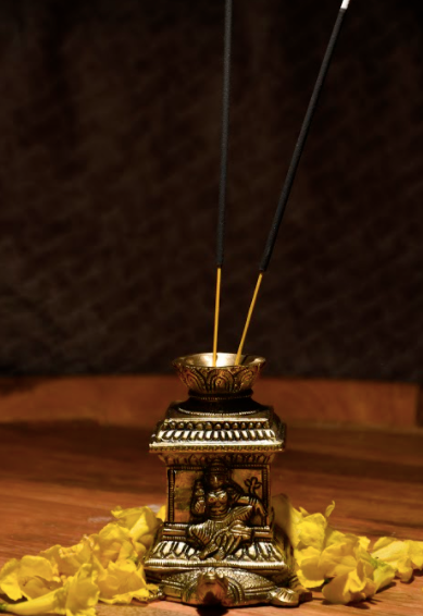 An Agarbatti / Incense Stand Made of Brass With Goddess Laxmi Mounted atop a Tortoise.