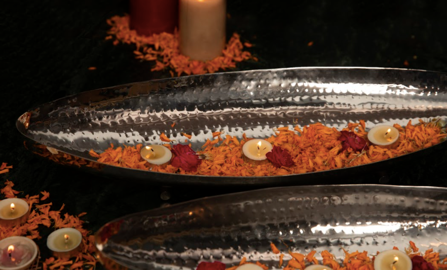 Made of Metal in a Silver finish, this tray set has hand beaten details running throughout the both the trays