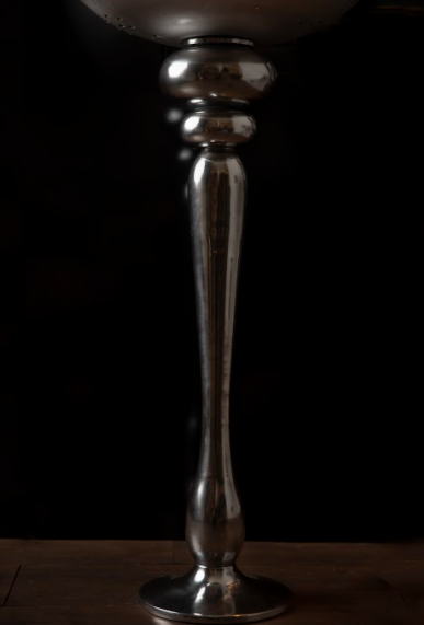 Made of Aluminium, the the Semi Dome rests on a tall stand, With a holding capacity of upto 7 bottles.