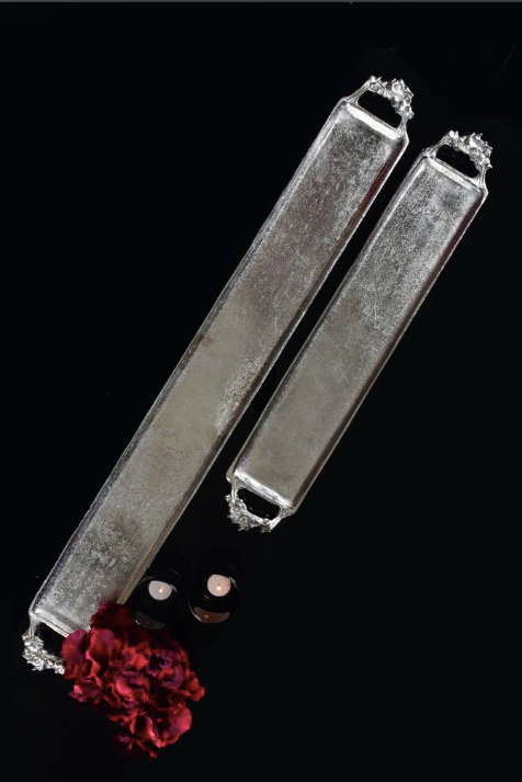 Made with Metal in a silver finish, these trays are available in Large & Medium Sizes.