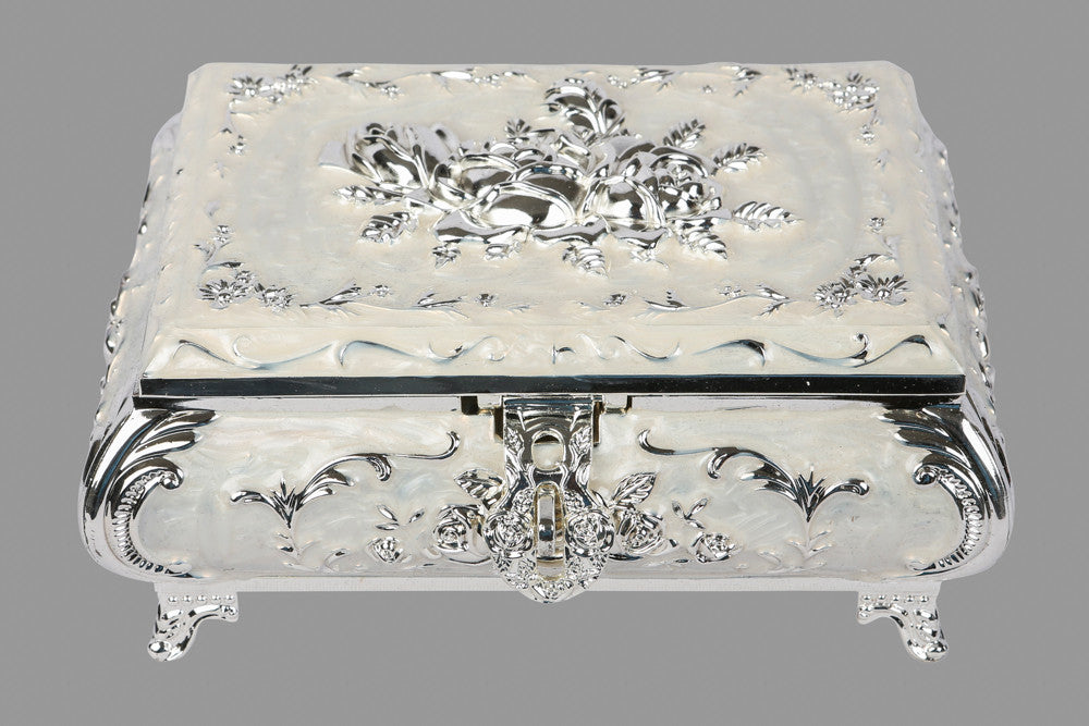 A silver box with carvings, perfect for gifting purposes or for storing of refreshments.