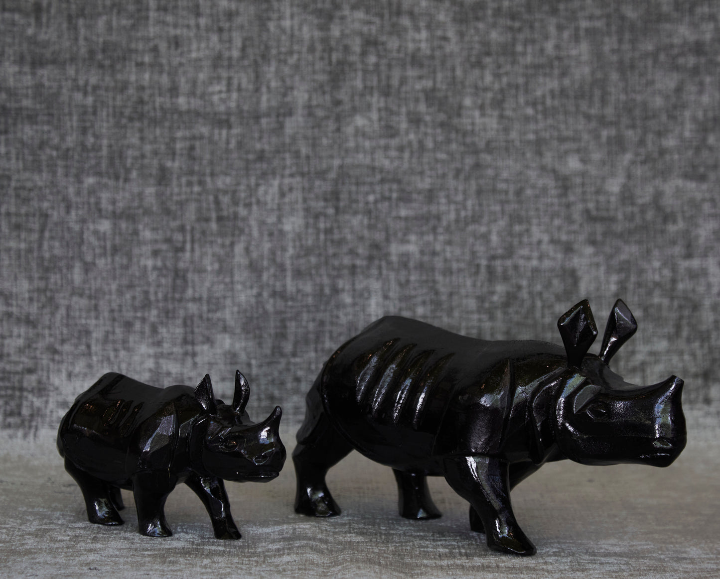 A Set Of Wooden Rhinos Made Of Mango Wood In Black Colour For Home Decor