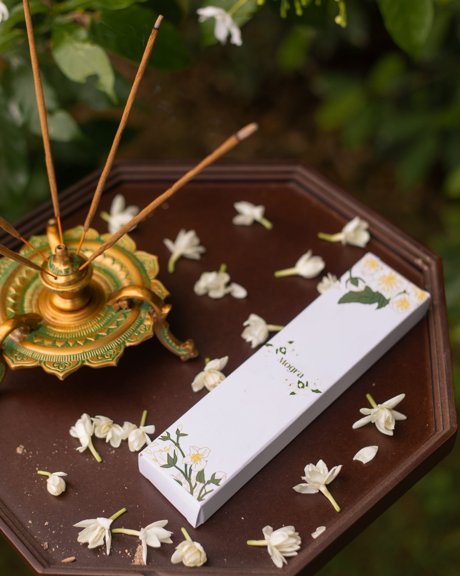 Introducing the *Aromatic Serenity Bundle—a delightful way to infuse your home with calming scents! This bundle features Our beautifully crafted box of Mogra Incense Sticks, Paired with an elegant Peacock Incense holder (White)