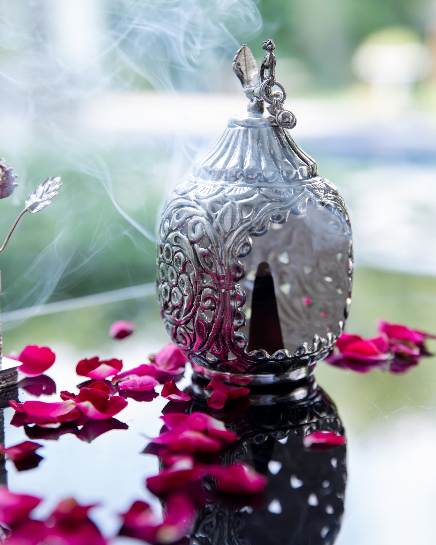 Coated with high-quality silver, this dhoop dhani radiates a lustrous and timeless glow.