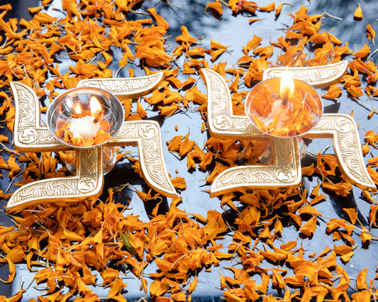 Our Swastik Diya features a radiant blend of gold and silver plating, creating a lustrous and timeless glow when lit.