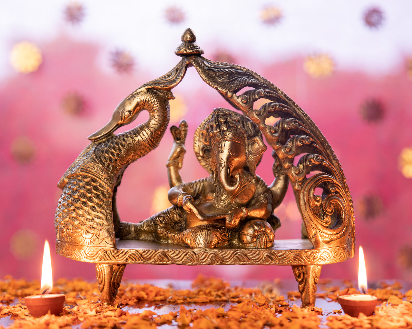 This intricately crafted pure brass idol radiates the majestic presence of Lord Ganesha