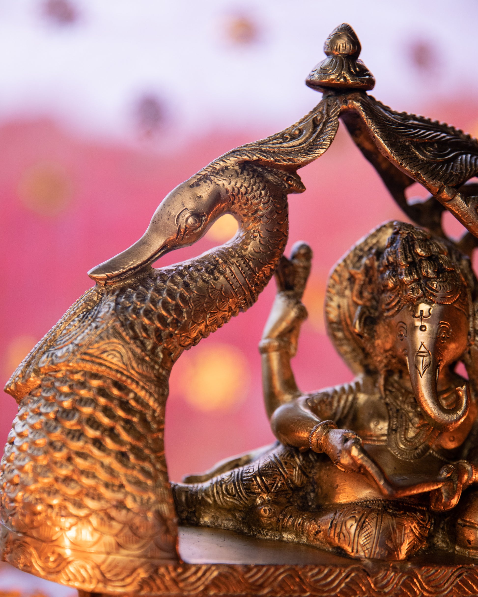 This intricately crafted pure brass idol radiates the majestic presence of Lord Ganesha