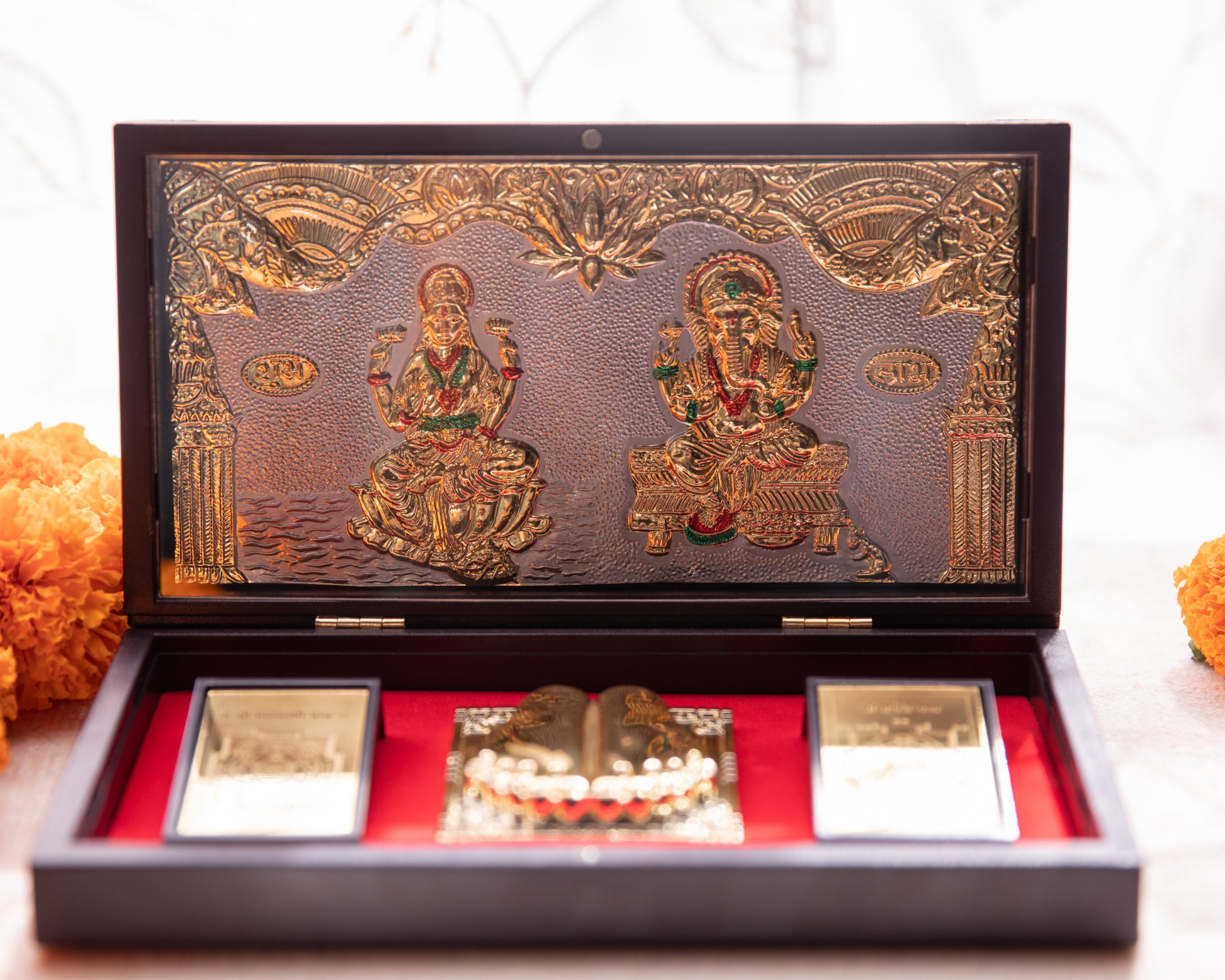 LeelaTheStore’s 24K Pooja Box comes as wooden box with the imagery wrapped using 24KT gold foil.  