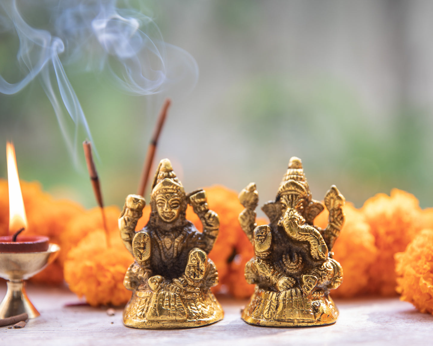 Brass Ganesh and Lakshmi