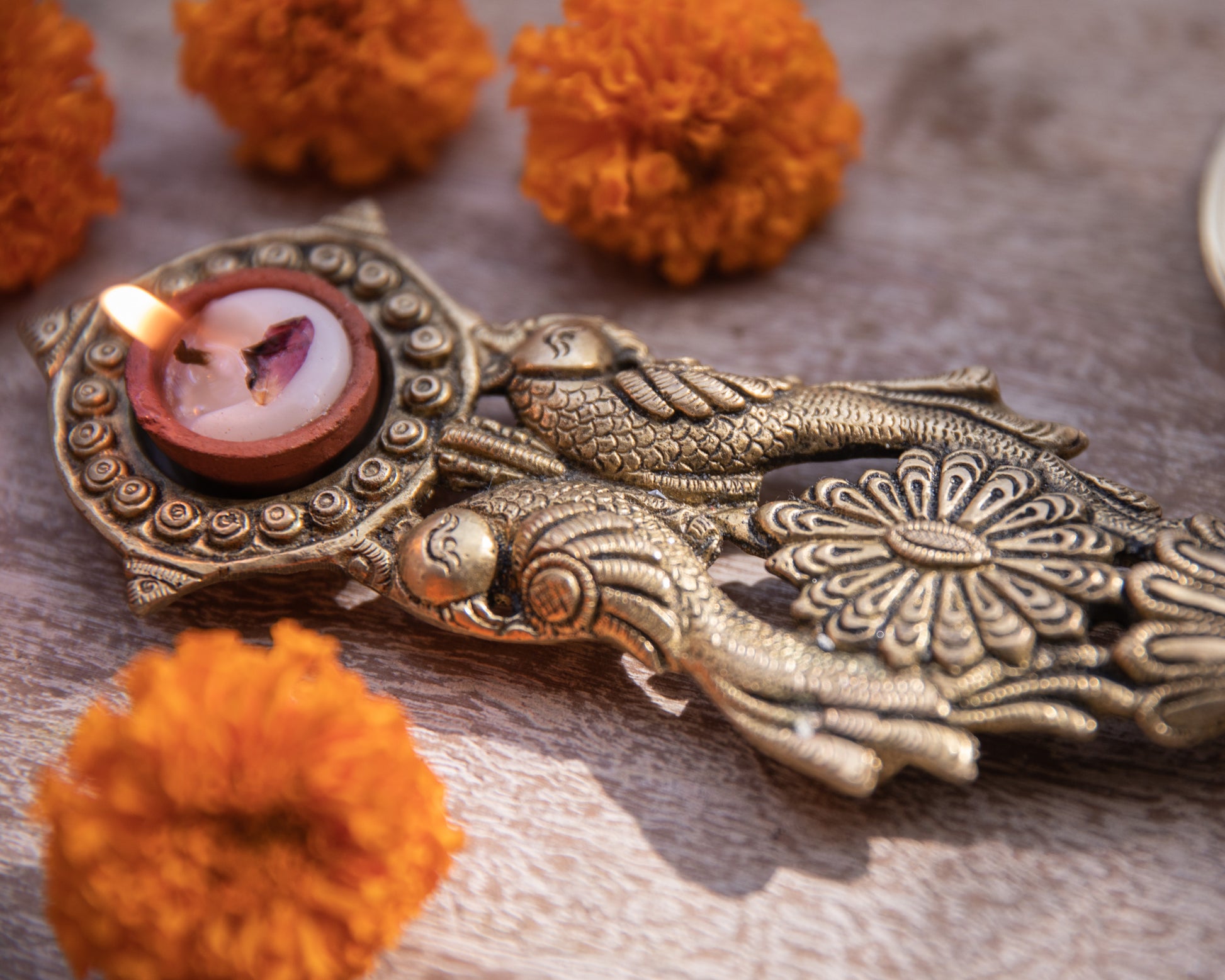 Our Brass Diya Holder is a magnificent piece of artistry that brings together tradition.