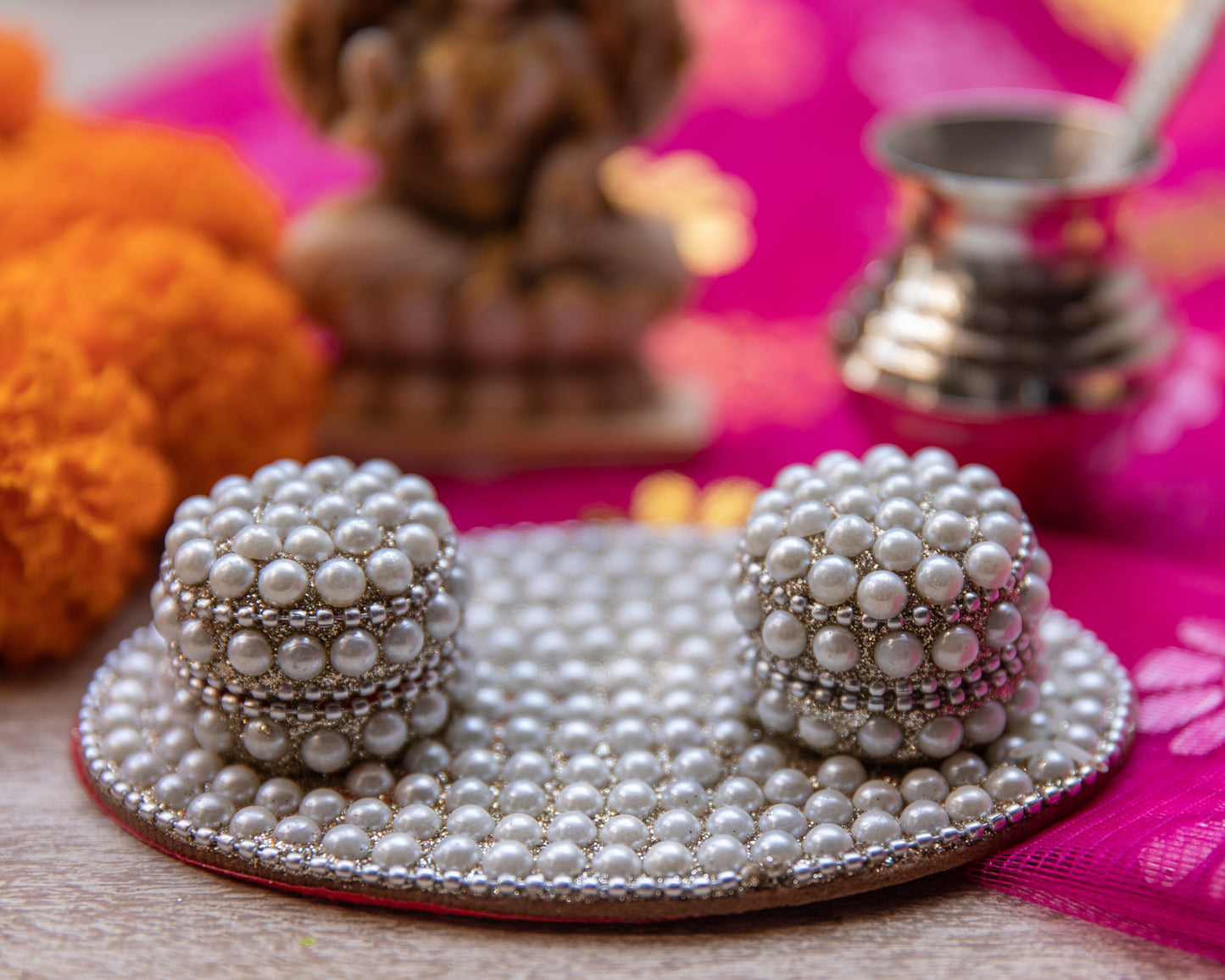 Our Pearl Akshat Dani is adorned with lustrous pearls, symbolizing purity and divinity.