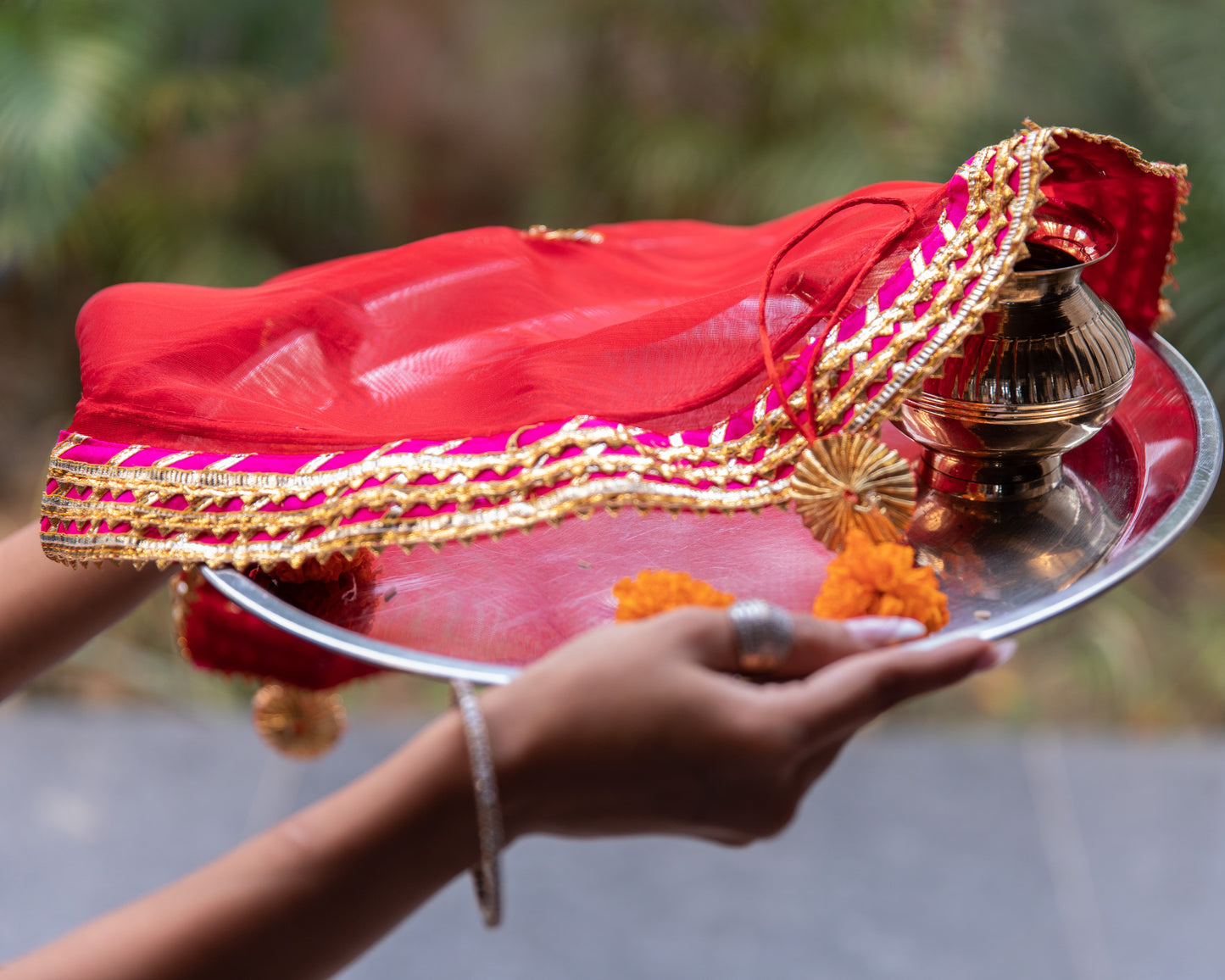 This beautifully crafted gota thali cover is designed to protect and enhance the presentation of your pooja thali.