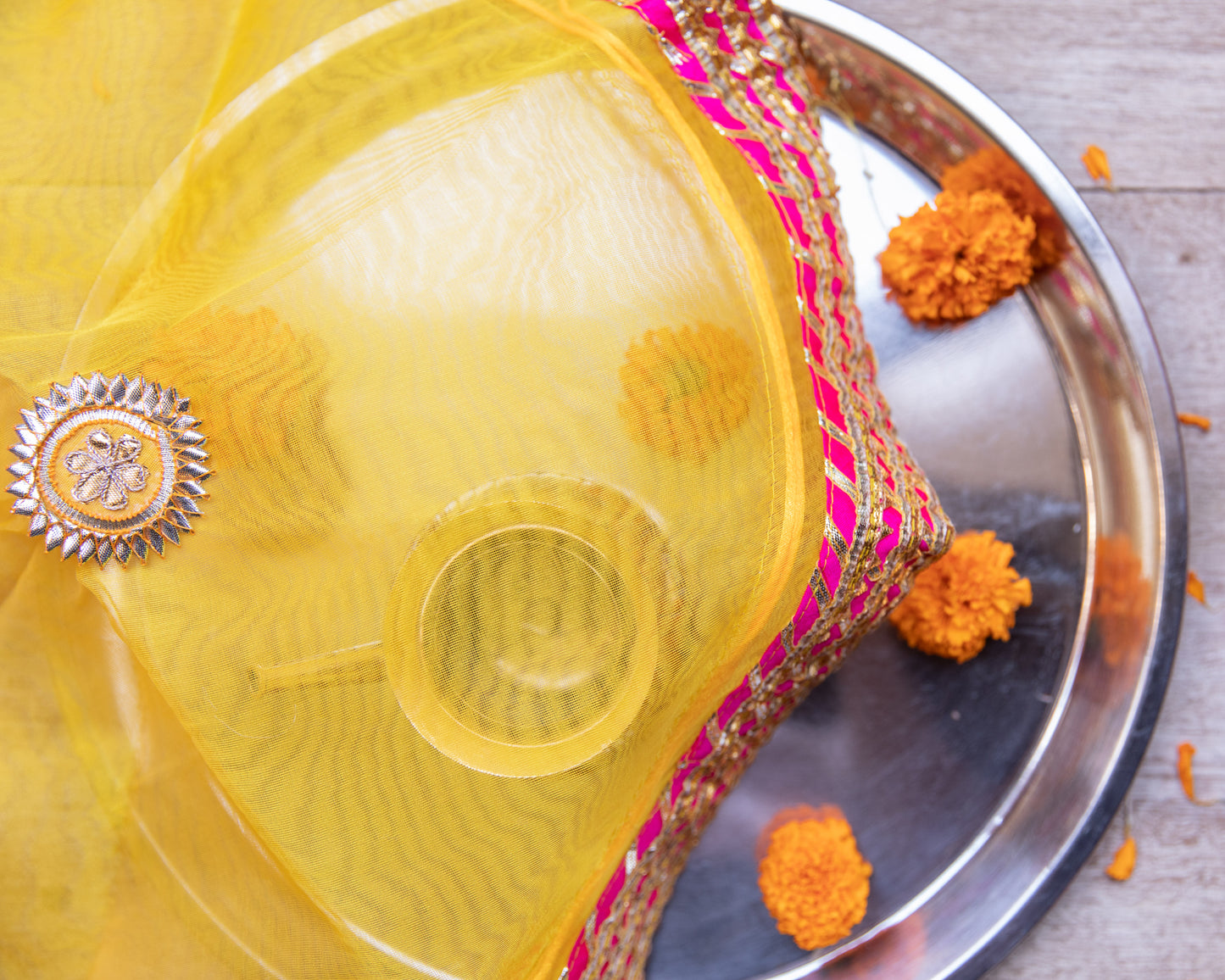 This beautifully crafted gota thali cover is designed to protect and enhance the presentation of your pooja thali.