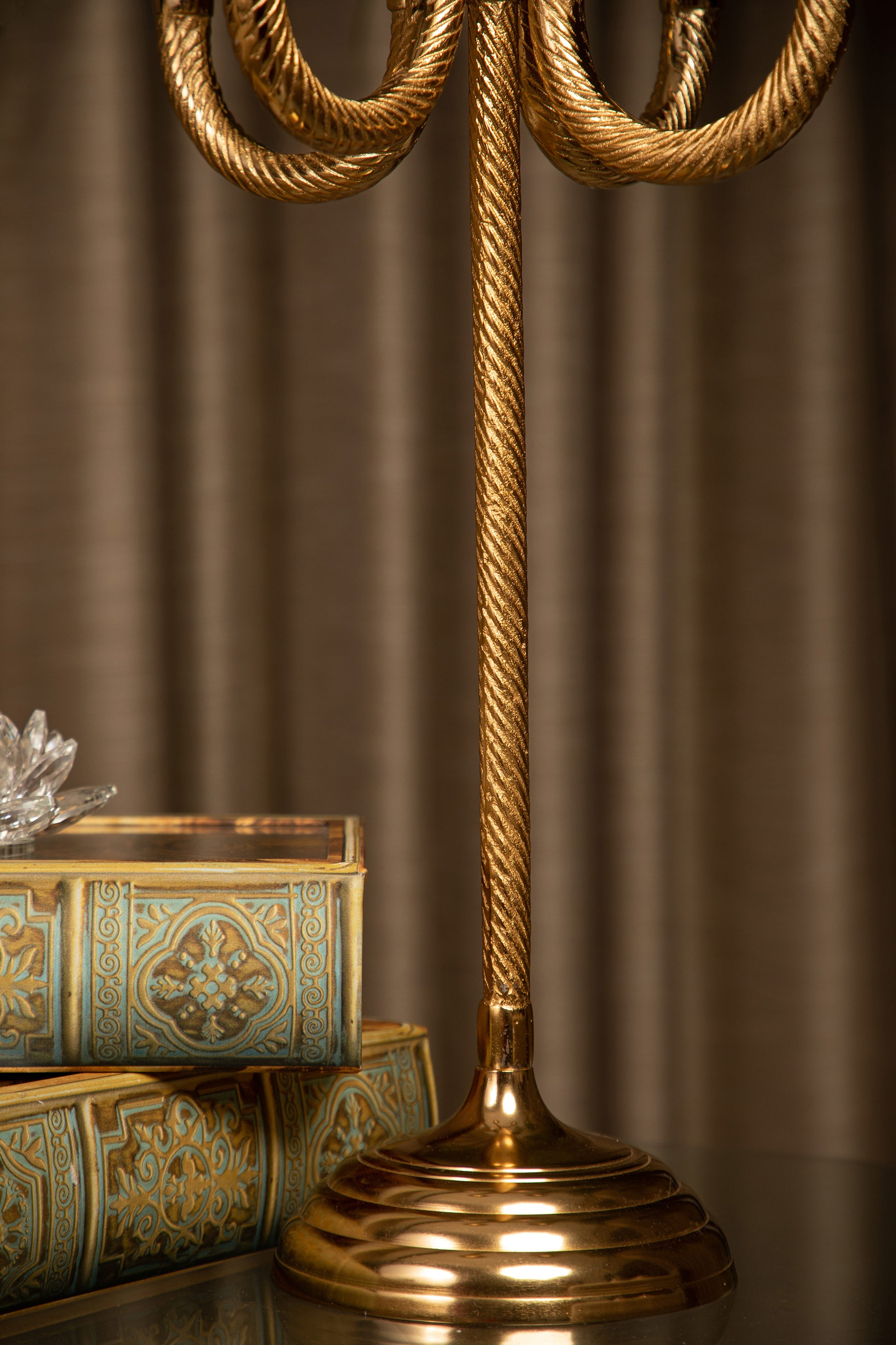 The candelabra boasts a classic and timeless design, making it a perfect fit for a wide range of interior styles, from traditional to modern.