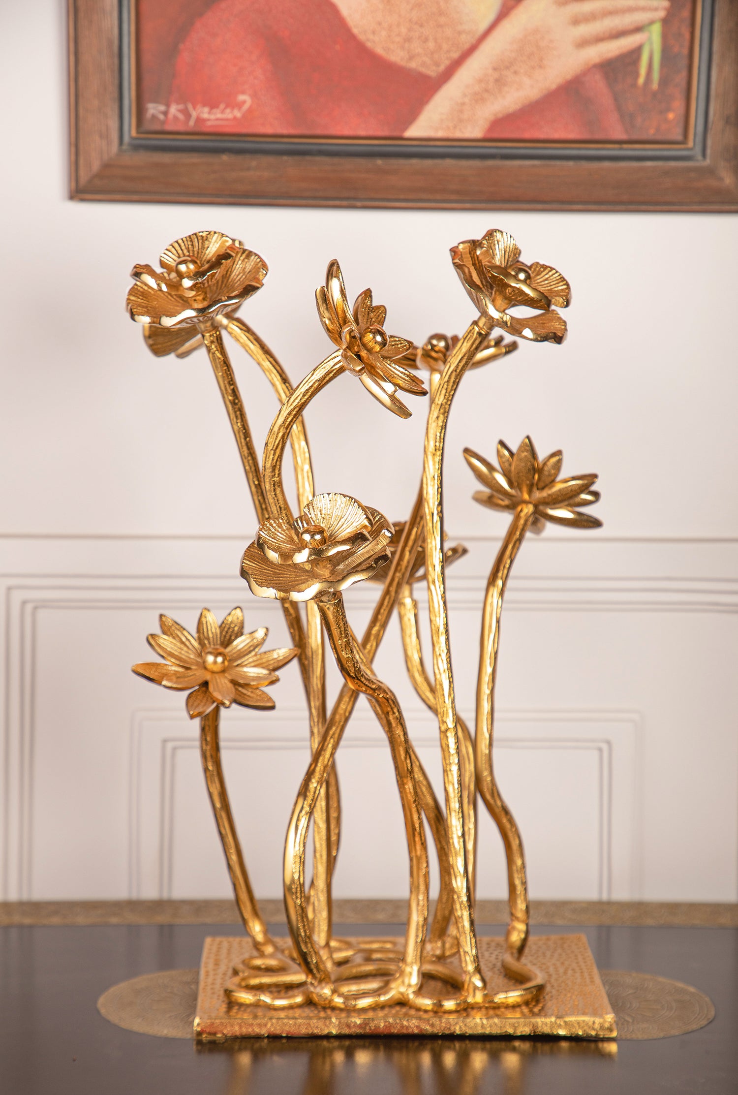Crafted from pure brass and inspired by the intricate details of blossoming flowers.
