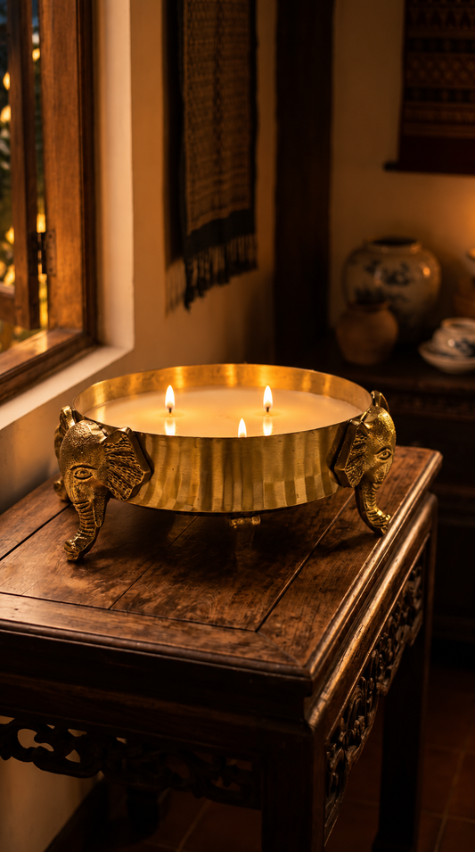 Gajraj Wax Urli - Filled with wax and lit with three wicks, it becomes a glowing centrepiece that turns any corner into a quiet sanctuary. Once the candle is spent, the urli lives on: fill it with water, float fresh flowers and tealights, or let it stand on its own as a sculptural accent on a console, coffee table, or pooja space. 