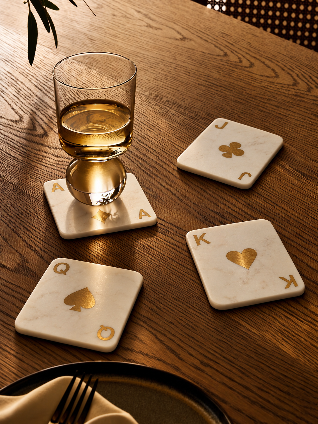 No Diwali is complete without the clink of glasses and a lively game of taash with family and friends. Our playing card coasters bring that cherished tradition straight to your table, crafted from pure white marble and inlaid with gleaming gold-finished brass suits. 